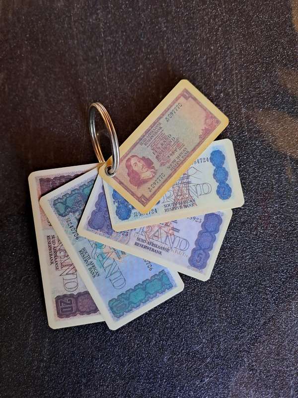 Vintage key ring showing old South African currency