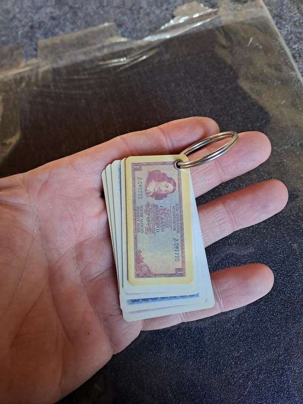 Vintage key ring showing old South African currency