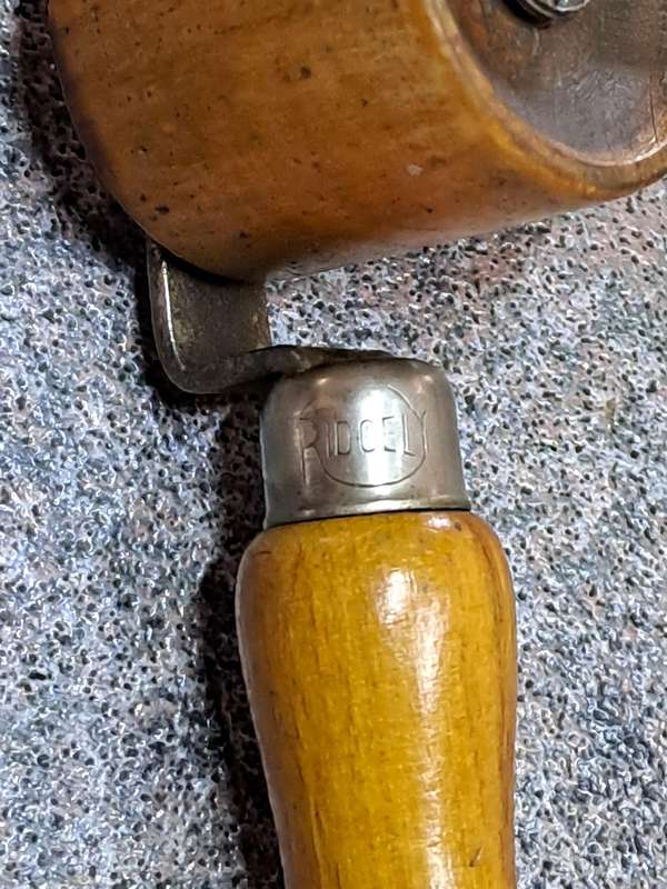 Vintage wooden seam roller for wallpaper made by Ridgely England