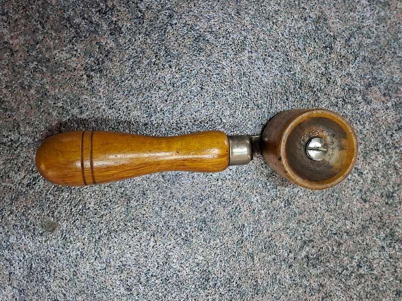 Vintage wooden seam roller for wallpaper made by Ridgely England