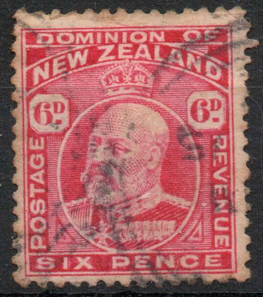 New Zealand 1909-12 6d carmine perf 14 fine used but heavy hinged. SG 398. Cat £10 (2022)
