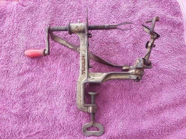CAST IRON TRUIMPH PEACH PEELER
