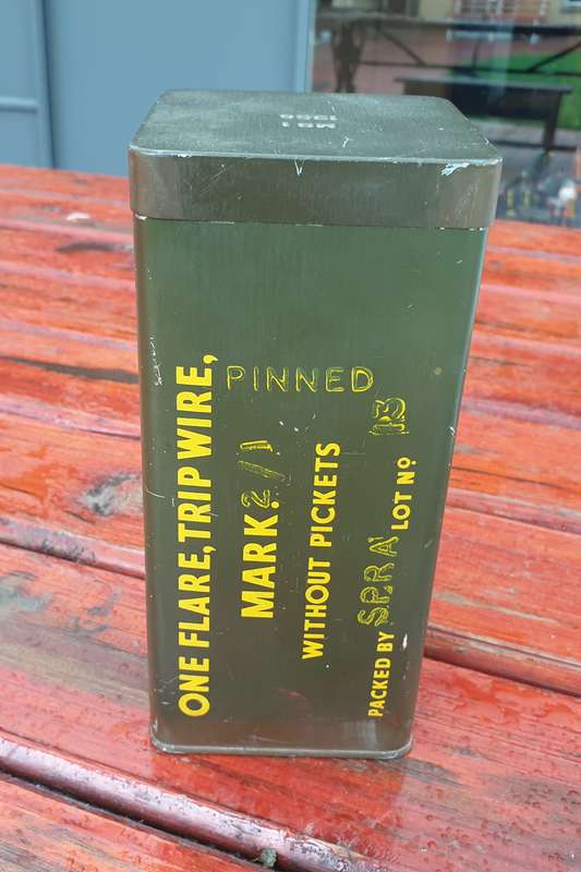1956 TRIP WIRE FLARE TIN