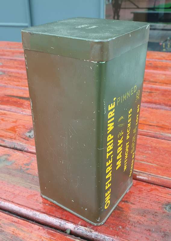 1956 TRIP WIRE FLARE TIN