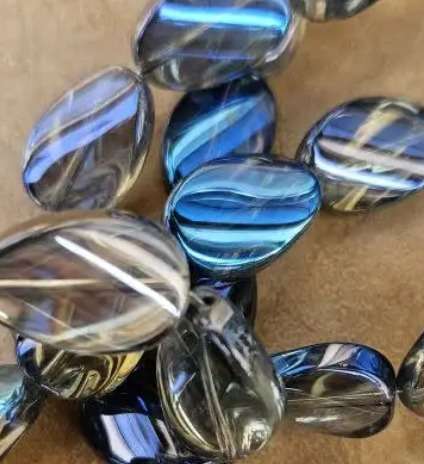 10 pieces (18x13mm) Dark Blue/Smoky Oval Twisted Electroplate Glass Beads. B9