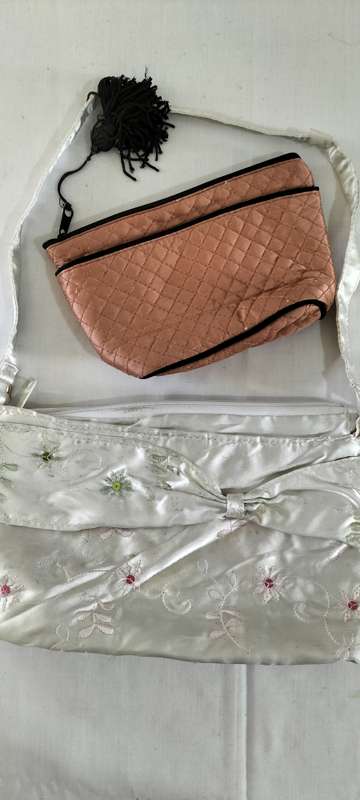 A Small Ladies Handbag and Makeup Bag