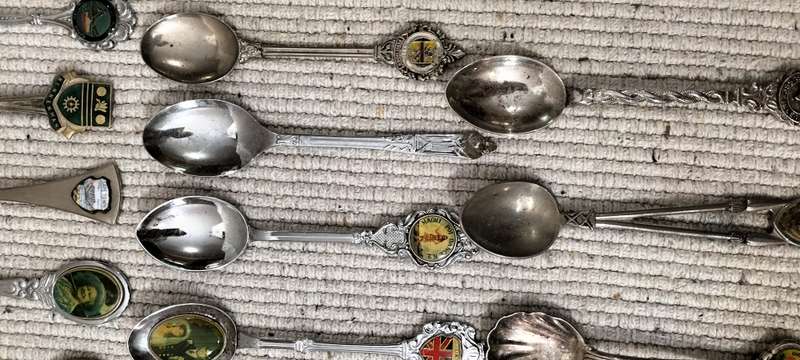A Collection of 26 Collectible Teaspoons