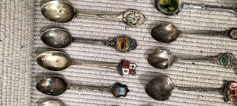 A Collection of 26 Collectible Teaspoons