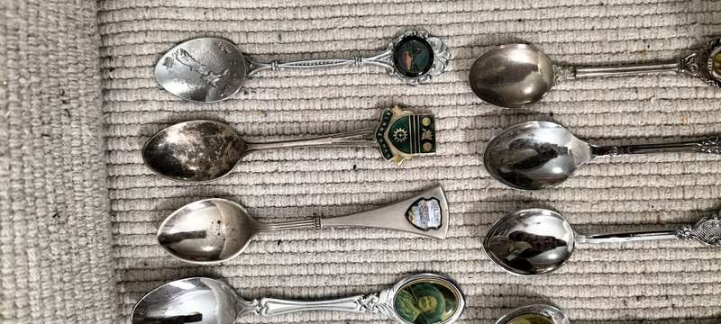 A Collection of 26 Collectible Teaspoons