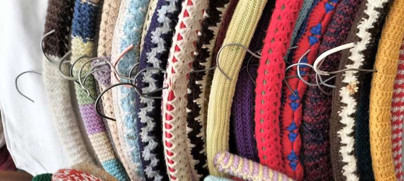 A Superb Collection of 58 Vintage Crochet/Knitting Covered Wooden Hangers