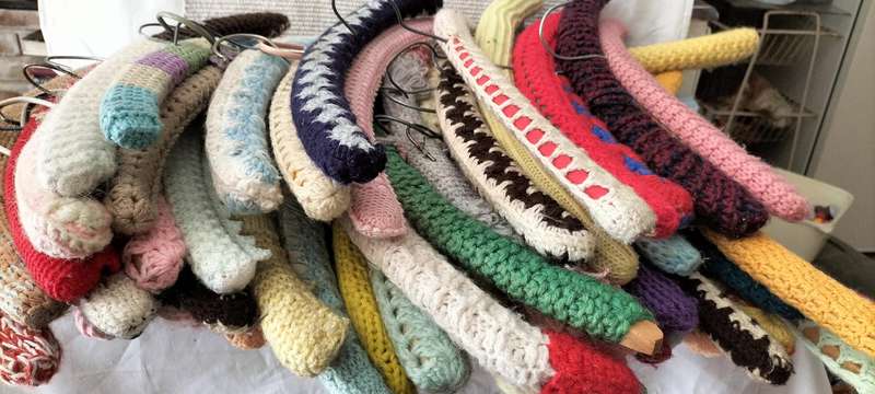 A Superb Collection of 58 Vintage Crochet/Knitting Covered Wooden Hangers