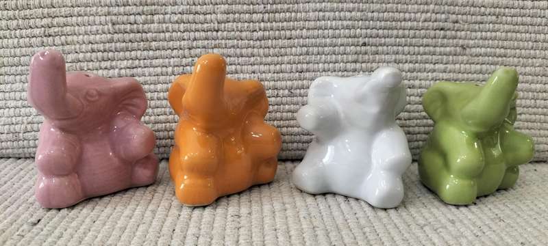 A Beautiful Set of 4 Glazed Ceramic Elephant Salt Shakers with Stoppers