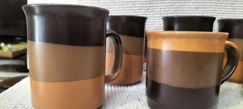 A Stunning 8 Piece Stoneware Coffee Mug Set