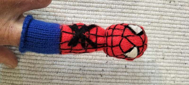 A Unique Knitted Spiderman Finger Puppet.