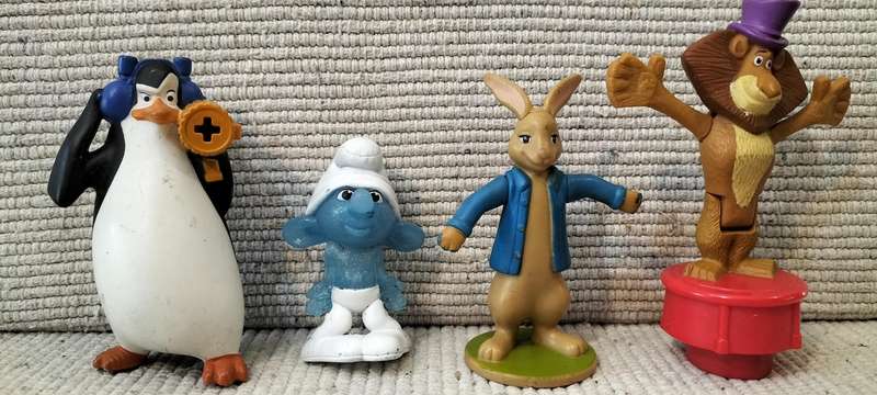 A Collection of 4 Rare Macdonald's Toys including a Very Rare Peter Rabbit and Clumsy Smurf