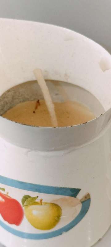 Small Enamel Jug With Candle