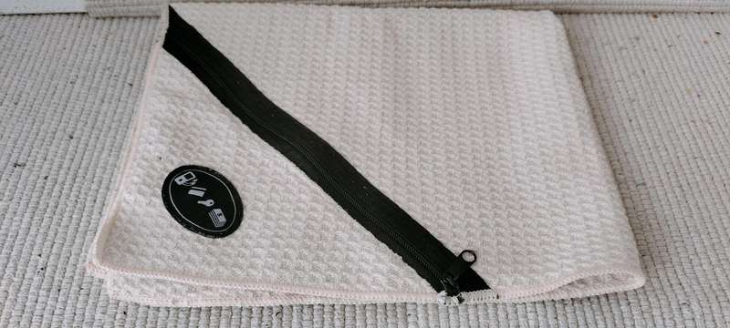 A Gym Face Towel with Zip Pocket for Keys/Phone