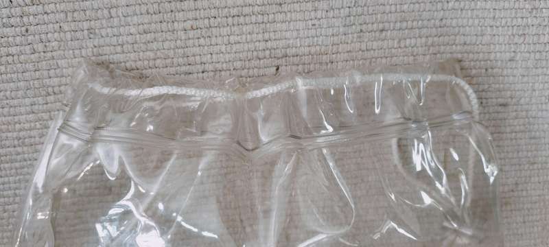 A Sturdy Thick Plastic Drawstring Bag for Wet Gym Clothes