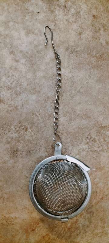 A Superb Intact Vintage Metal Tea Strainer