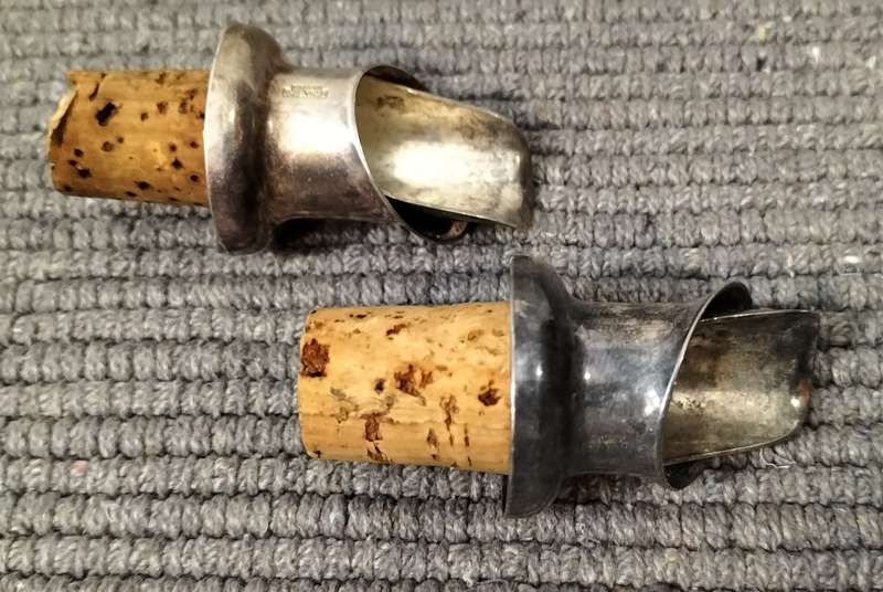 A Pair of Silver Plated Bottle Pourers