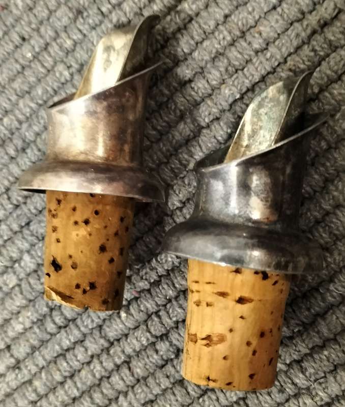 A Pair of Silver Plated Bottle Pourers