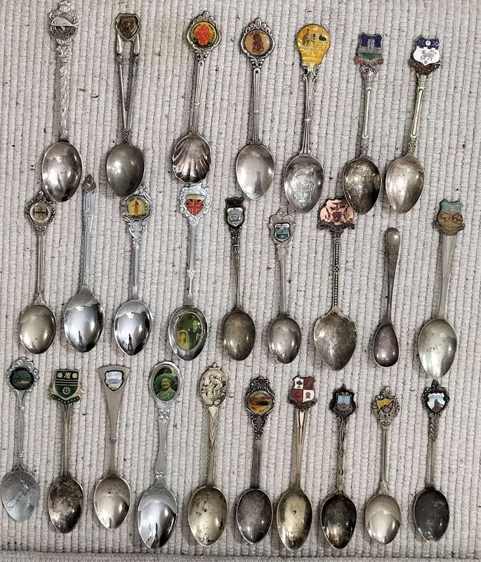 A Collection of 26 Collectible Teaspoons