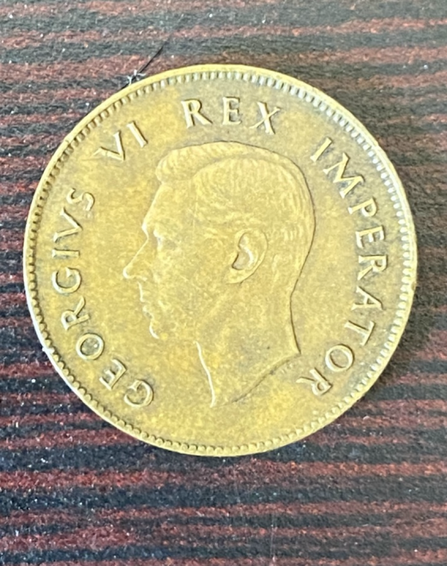 South African Farthing coin, specifically dated 1942. king George version