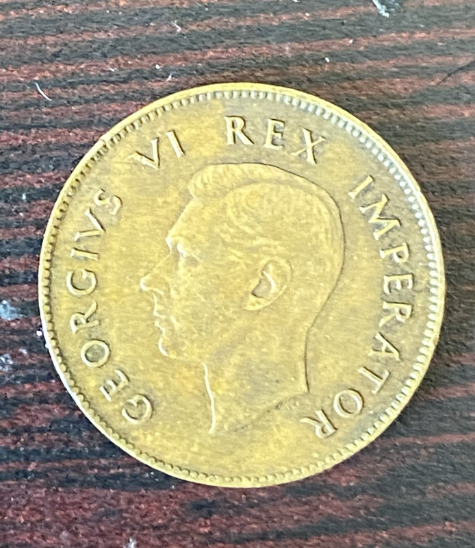 South African Farthing coin, specifically dated 1942. king George version