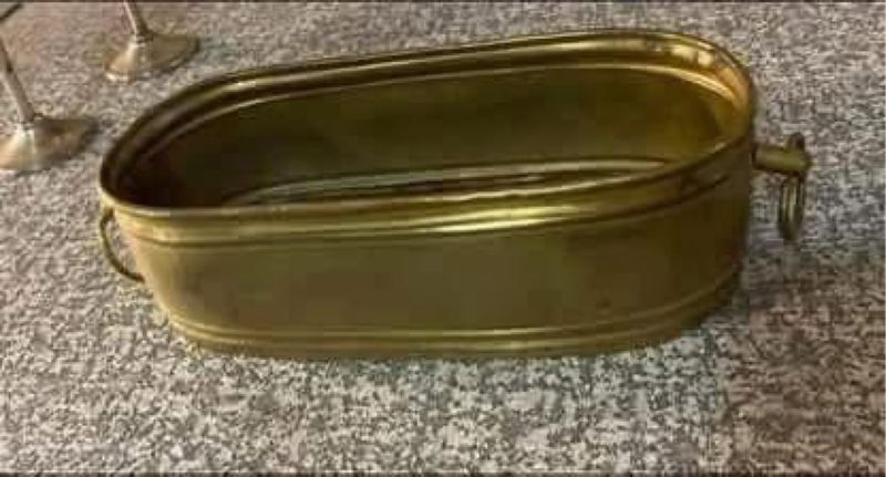 Antique brass tub planter