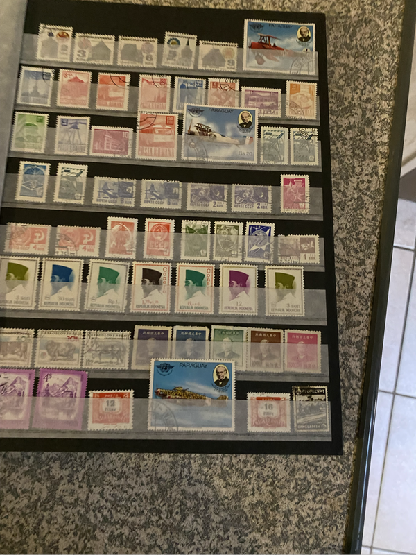 Complete 12 pages stamp book - stamps from all over the world