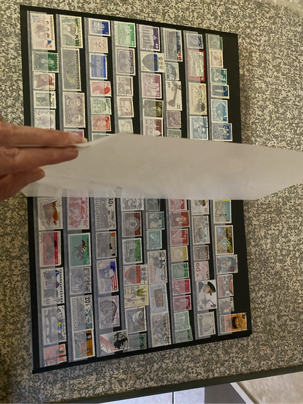 Complete 12 pages stamp book - stamps from all over the world