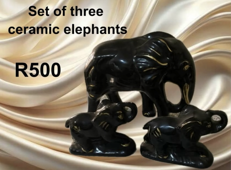 3 ceramic elephants - One large and two small.