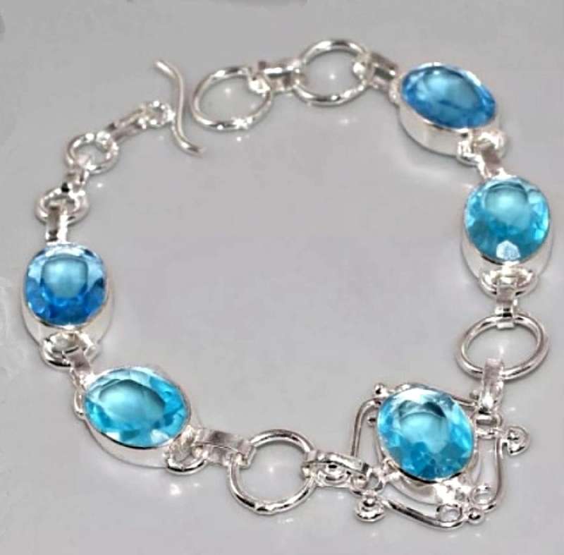 Stunning Blue Topaz Oval Gemstones in .925  Sterling Silver Plated Handmade Bracelet