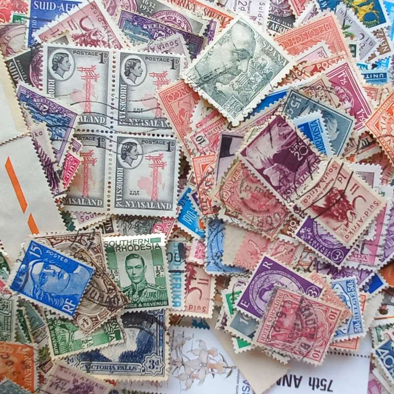 "Walkers" Chocolate Tin full of Stamps off paper - Mixed World