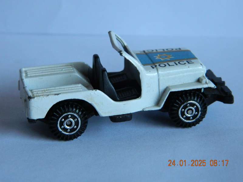 UNKNOWN   -    -     POLICE JEEP