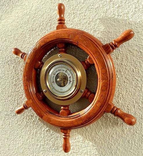 SHIPS WHEEL BAROMETER, BARIGO, WESTERN GERMANY, EXCELLENT AND WORKING, DIAMETER 31,5 cm