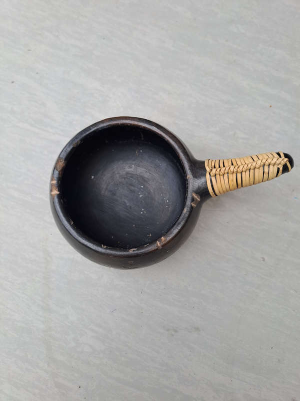Traditional African clay handled pot