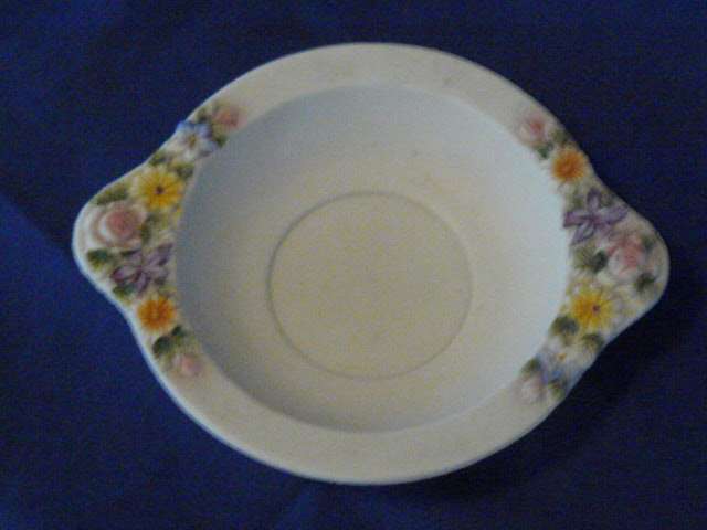 CERAMIC VASE WITH FEET AND FLOWERS - AND A BOWL