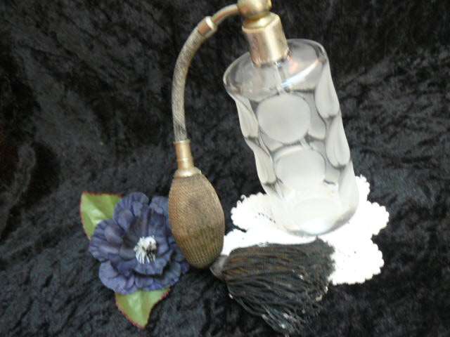 ANTIQUE PERFUMEGLASS DISPENSOR....REFILLABLE WITH TASSEL HEAVY AND NICE PATTERN