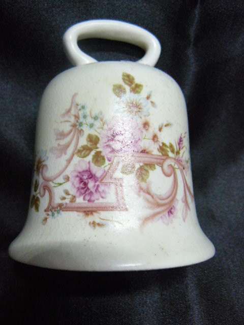 CERAMIC BELL CRESENT EST 1995