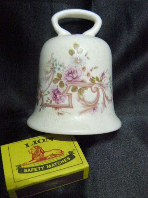 CERAMIC BELL CRESENT EST 1995