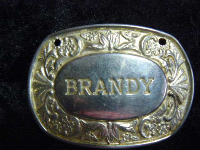 SILVER PLATED ENGLAND BRANDY BOTTLE LABLE STAMPED