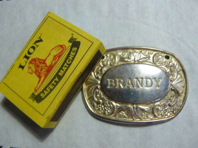 SILVER PLATED ENGLAND BRANDY BOTTLE LABLE STAMPED