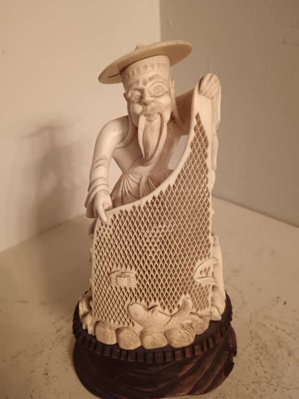Carved Chinese Fisherman with Net