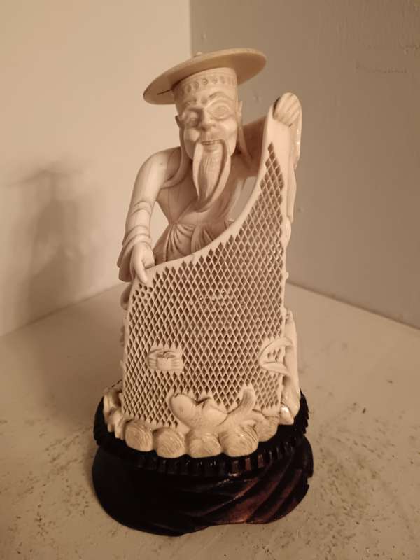Carved Chinese Fisherman with Net