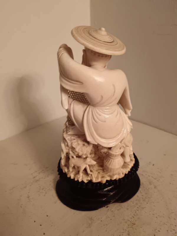 Carved Chinese Fisherman with Net
