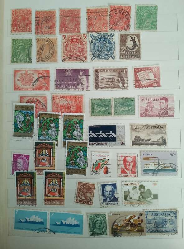 MIXED ALBUM STAMPS.RSA.RHODESIAS.BOTSWANA.AUSTRALIA.USA AND MORE SEE SCANS