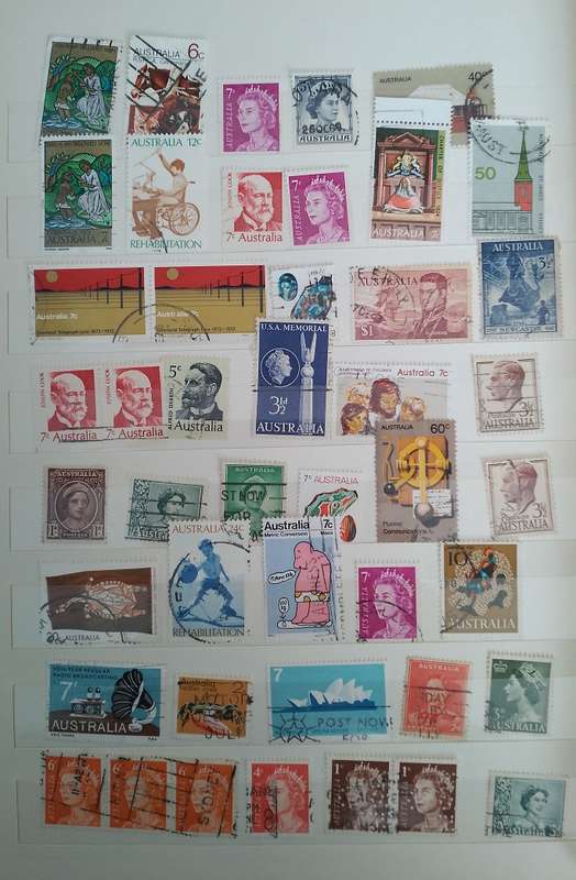 MIXED ALBUM STAMPS.RSA.RHODESIAS.BOTSWANA.AUSTRALIA.USA AND MORE SEE SCANS