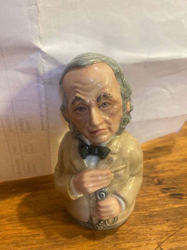 Collection of Royal Doulton character jugs , ashtrays and candle snufflers