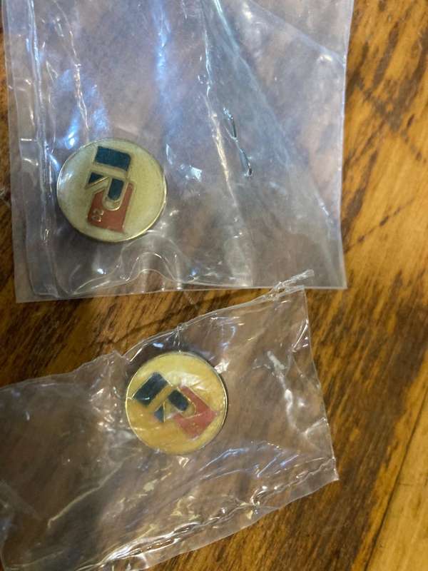 Collection of Afticana Pins and Badges